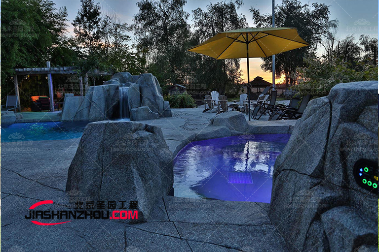 三門峽市九龍生態(tài)園內(nèi)塑石假山景觀水池制作