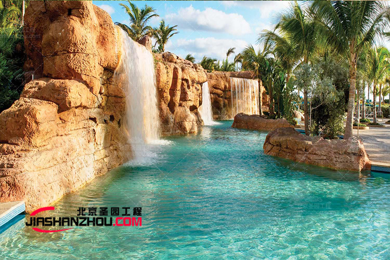 植物的加入使水池塑石假山景觀設(shè)計(jì)與周圍環(huán)境緊密相連